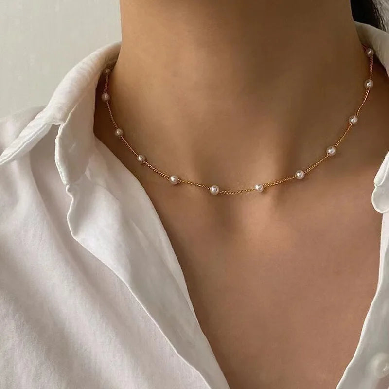 Elegant 3-Piece Pearl Necklace Set with Gold-Tone Heart Pendant