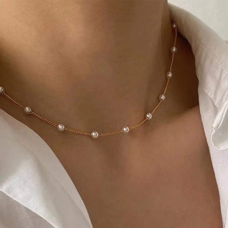 Elegant 3-Piece Pearl Necklace Set with Gold-Tone Heart Pendant