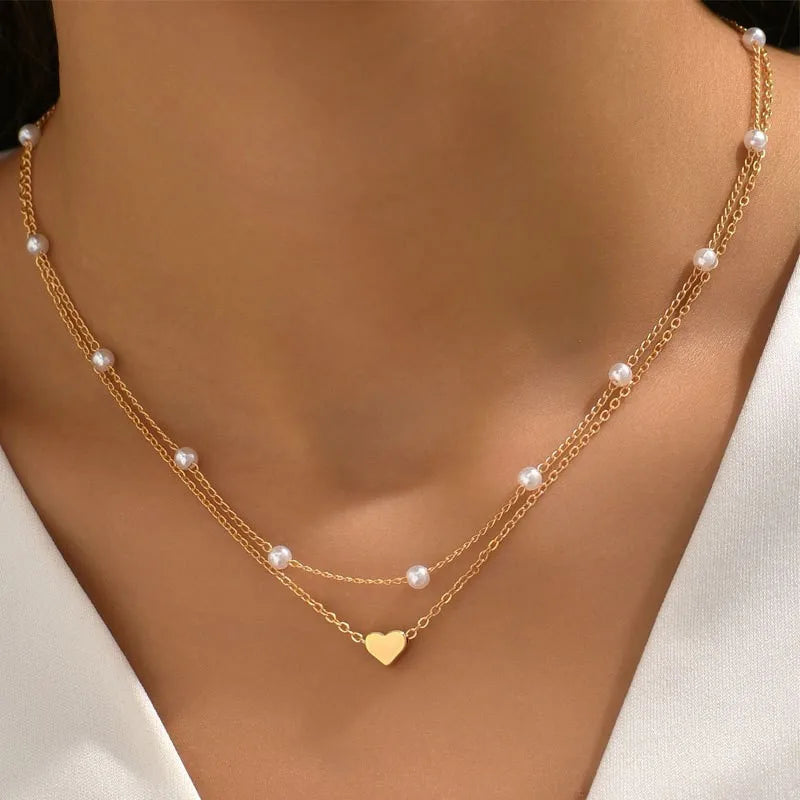 Elegant 3-Piece Pearl Necklace Set with Gold-Tone Heart Pendant
