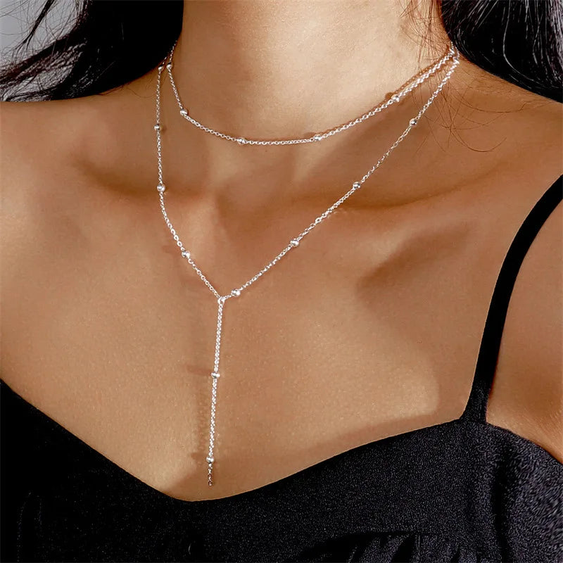Elegant Double Layered Tassel Necklace – Geometric Beads & Zinc Alloy